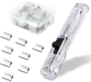 TE Push Stapler with office supplies on a desk, including paper clips and documents.