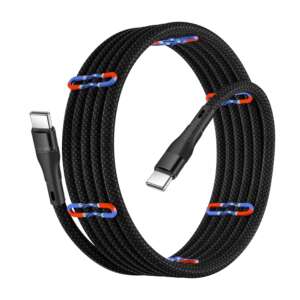 Black magnetic coiled Type C to Type C charging cable connected to a smartphone and laptop, showcasing durability and compatibility.