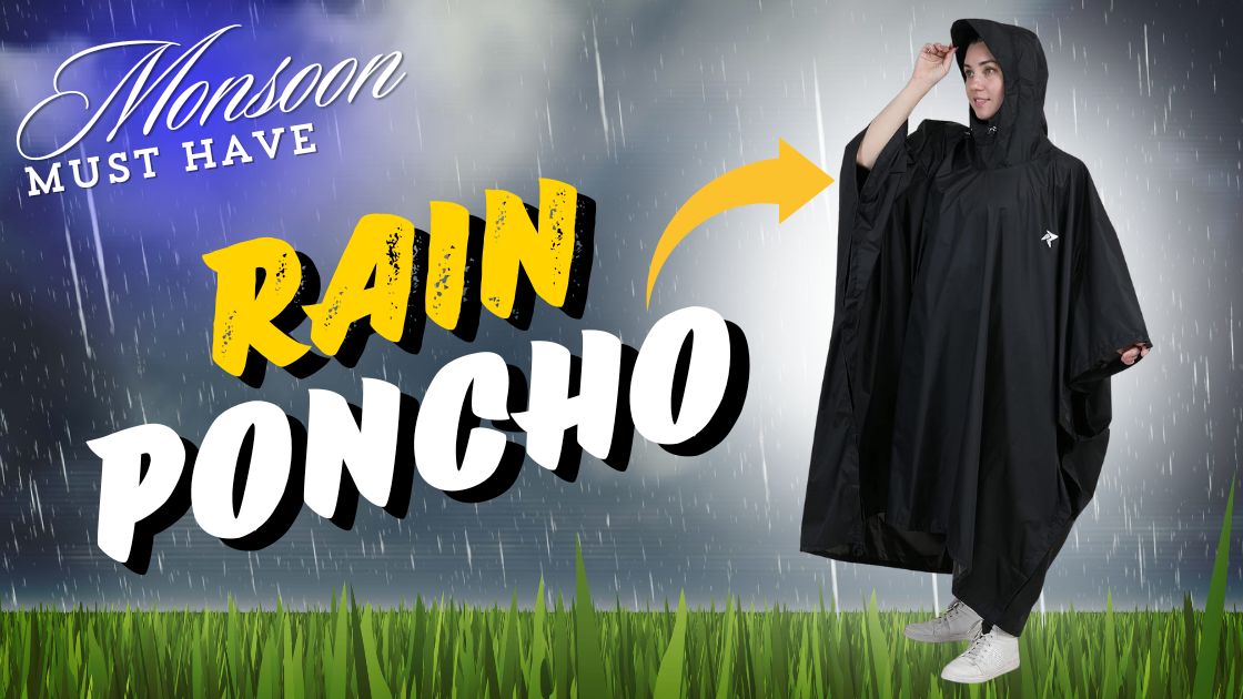 Person wearing a Rocksport rain poncho while hiking in a lush forest during a light rain.